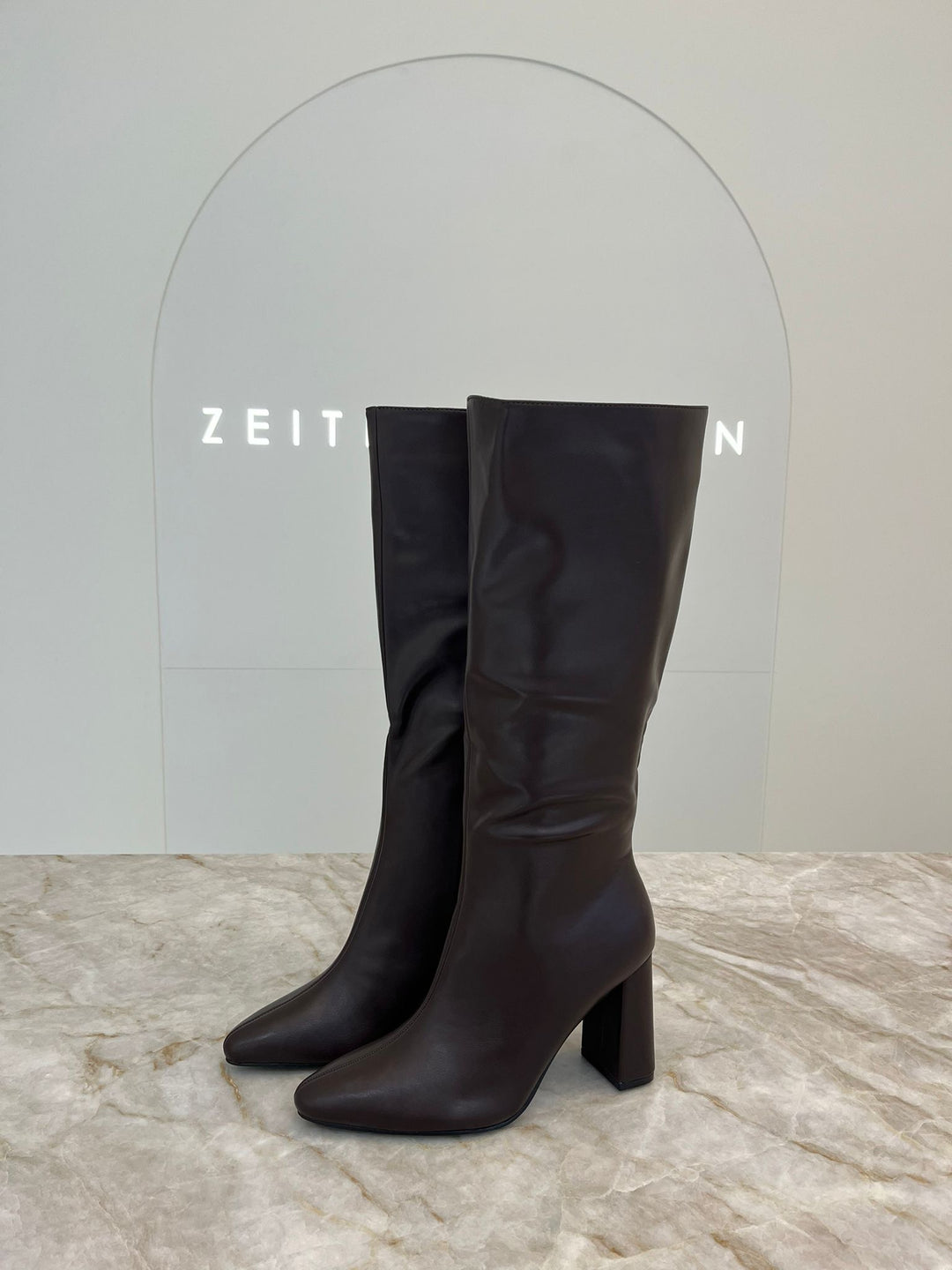 Sleek Leather Heeled Boots