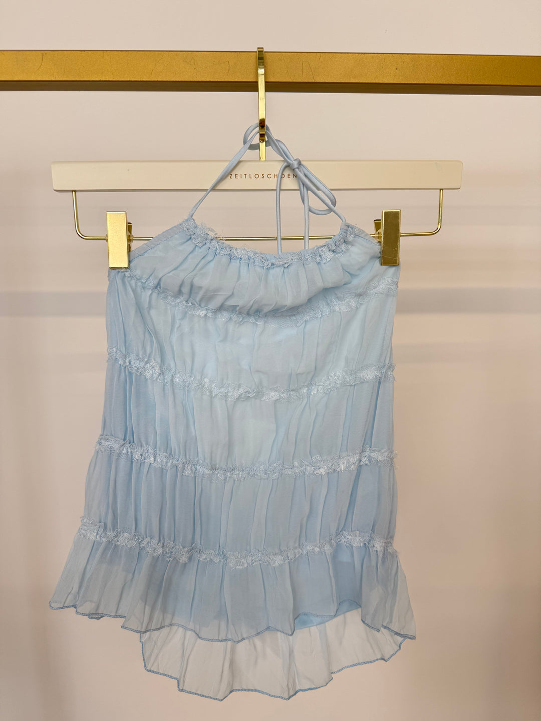 SUNLIT RUFFLE TOP SOFT BLUE GR.M/L (B-WARE)