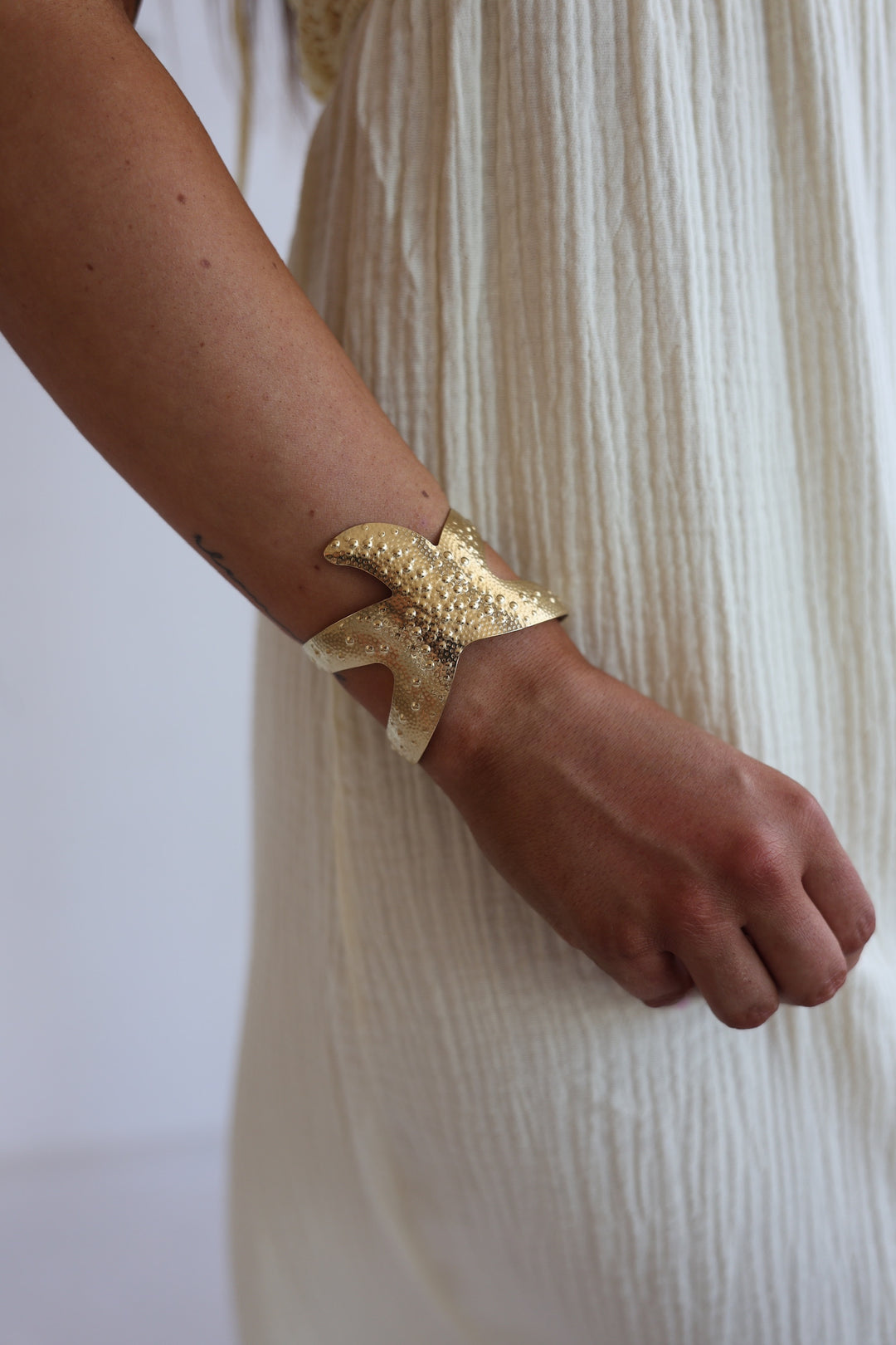 Armreif Golden Starfish